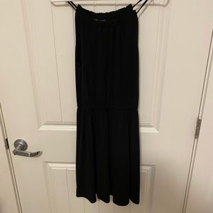 Black Spaghetti Strap Dress. Cinches at the waist. Stretch Material